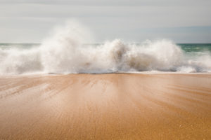 Surf on the beach of Carvoeiro, Atlantic Ocean, Algarve, Faro district, Portugal Surf on the beach of Carvoeiro, Atlantic Ocean, Algarve, Faro district, Portugal